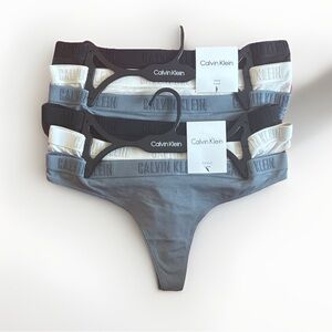 Calvin Klein White Logo Hang Tags with Black Text